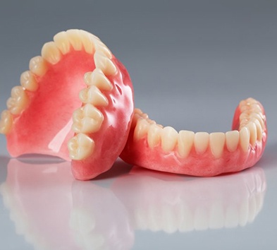 Model of two sets of full dentures