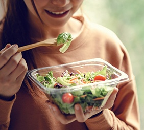 Woman eating a salad