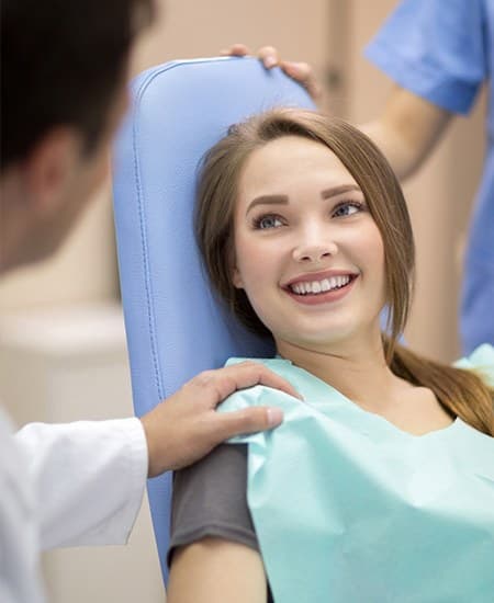 Smiling woman in dental chair