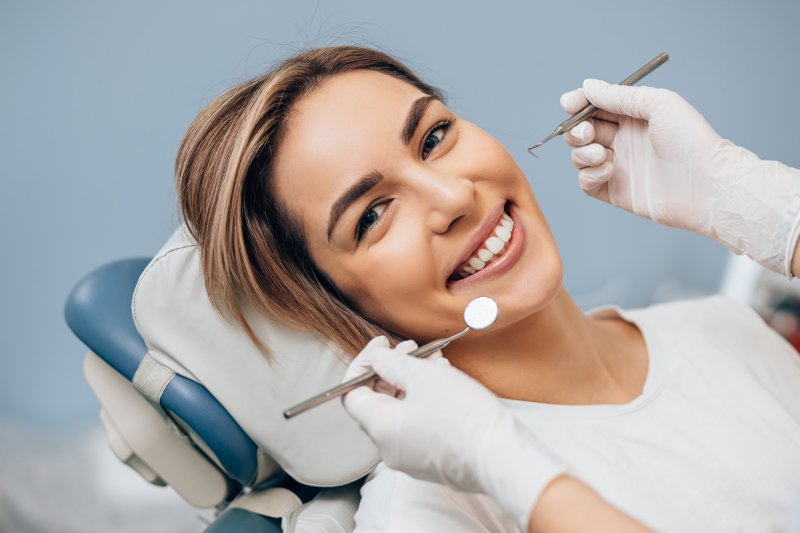 A woman who is a good dental implant candidate