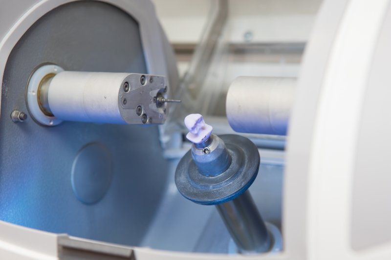 A closeup of a CEREC dental milling machine